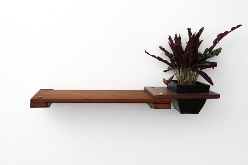 Bamboo shelf with planter pot