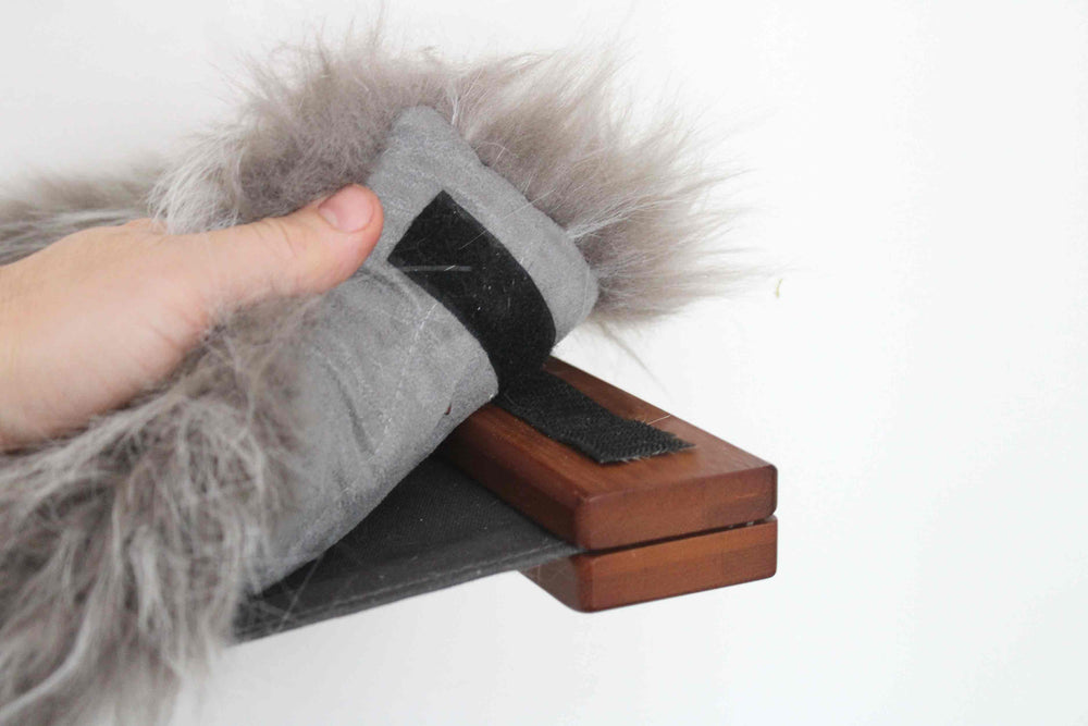 plush pad being placed on hammock